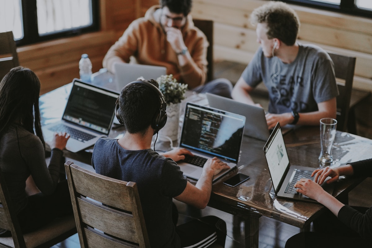 Colleagues collaborating at a shared table